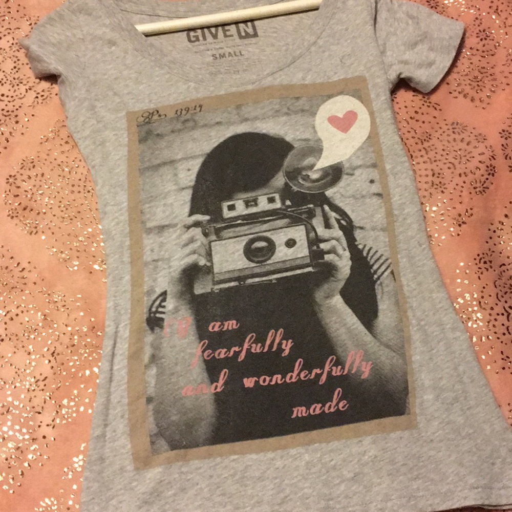 Its a Gray shirt in good condition never been worn